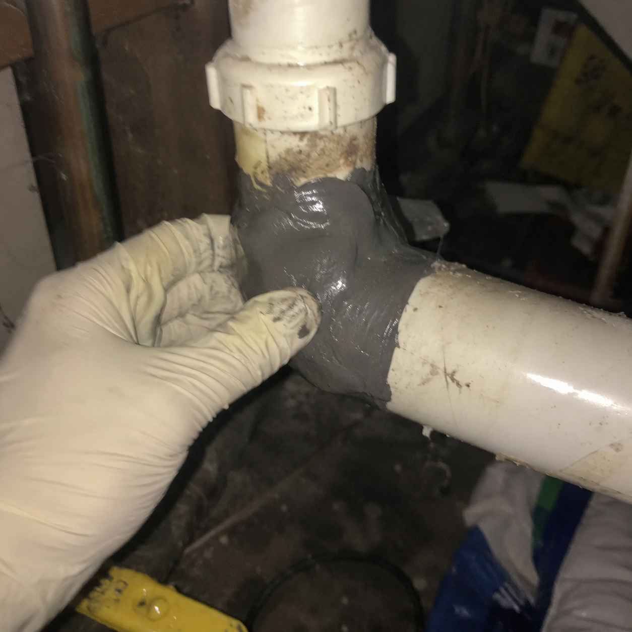 Customer repairing a cracked outdoor water tank