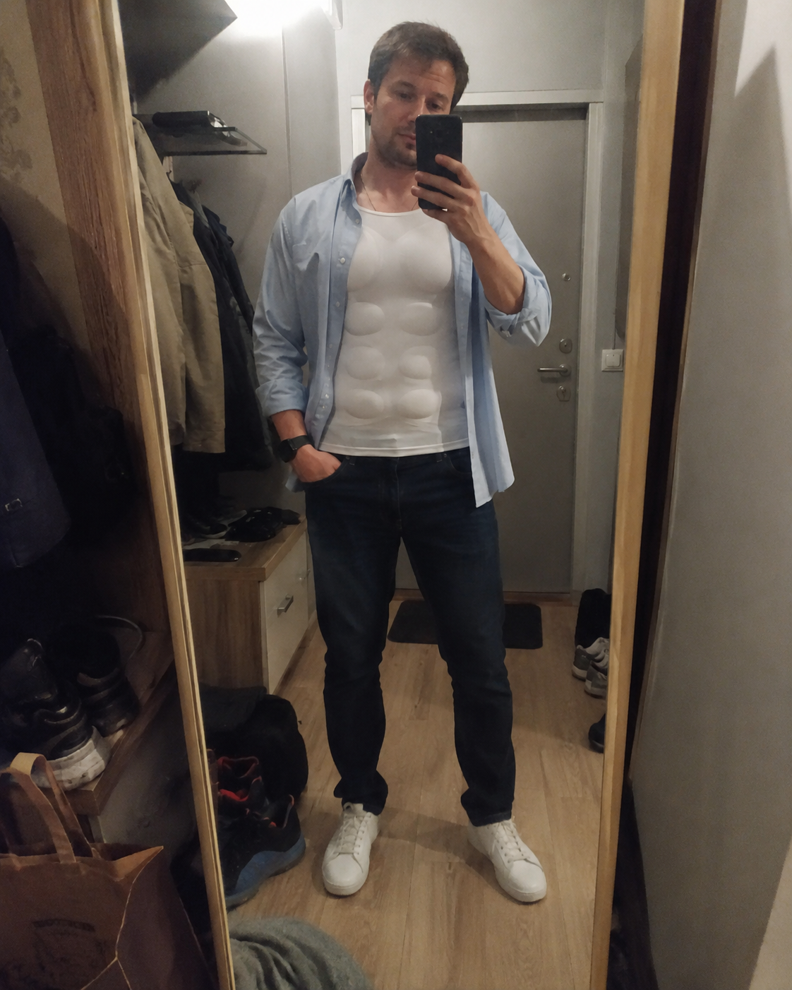 Customer full-length mirror photo wearing the muscle shaper