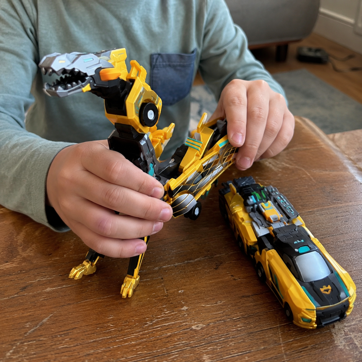 Close-up of hands changing the magnetic toy between car and dinosaur modes