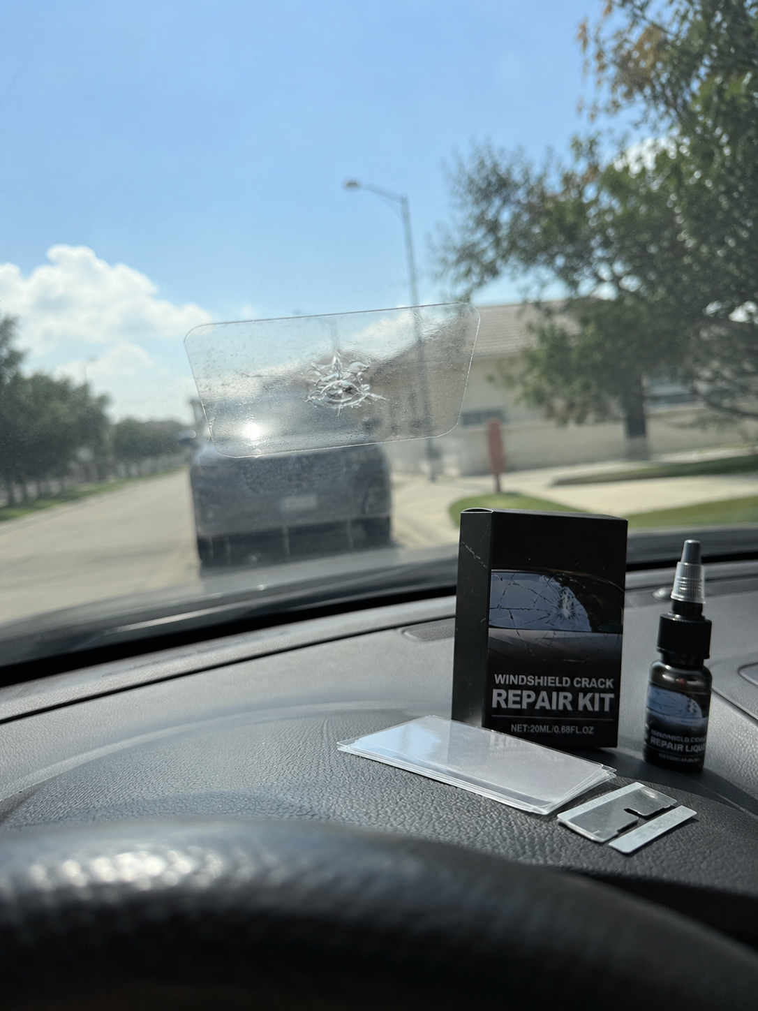 Small windshield star chip photographed before treatment