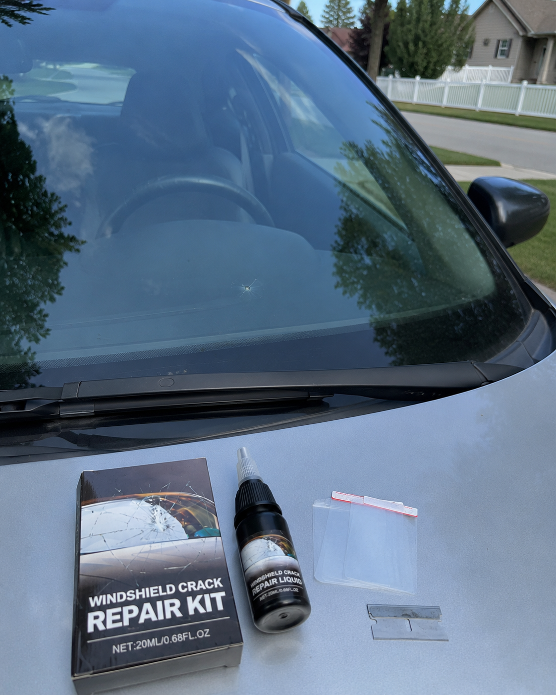 Windshield chip repair viewed from outside the vehicle