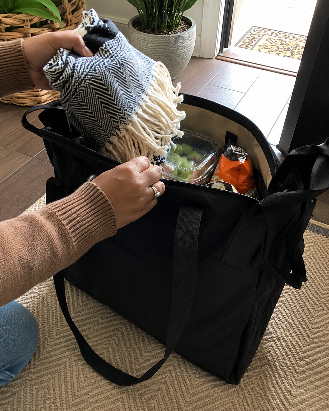 Customer carrying the convertible picnic tote