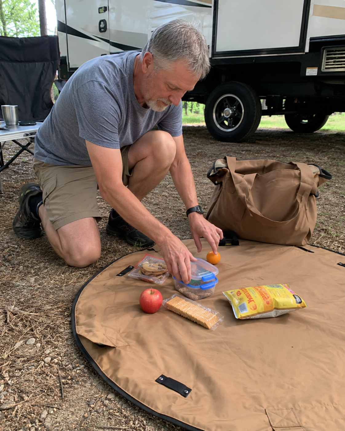 Customer packing and using the picnic mat outdoors