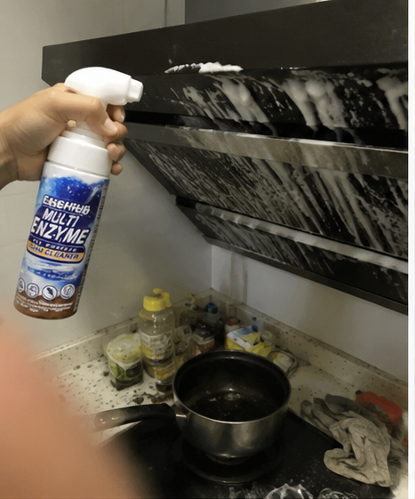 Customer cleaning grease from a kitchen range hood