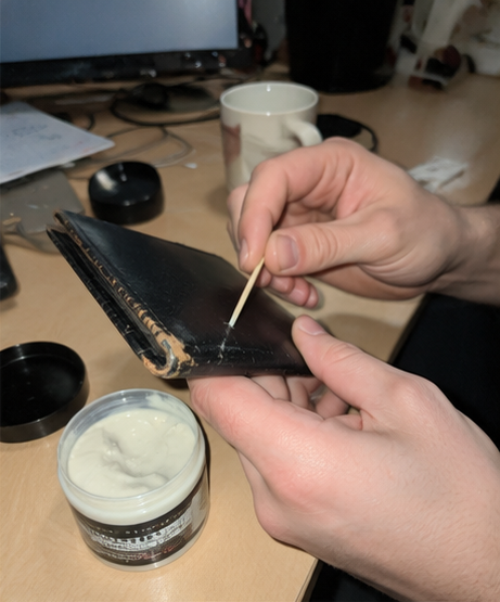 Close-up customer photo of leather filler application